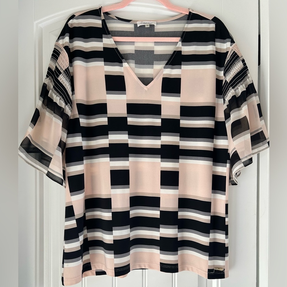 Women’s XL Calvin Klein blouse.  Used a hand full of times.  Great condition.